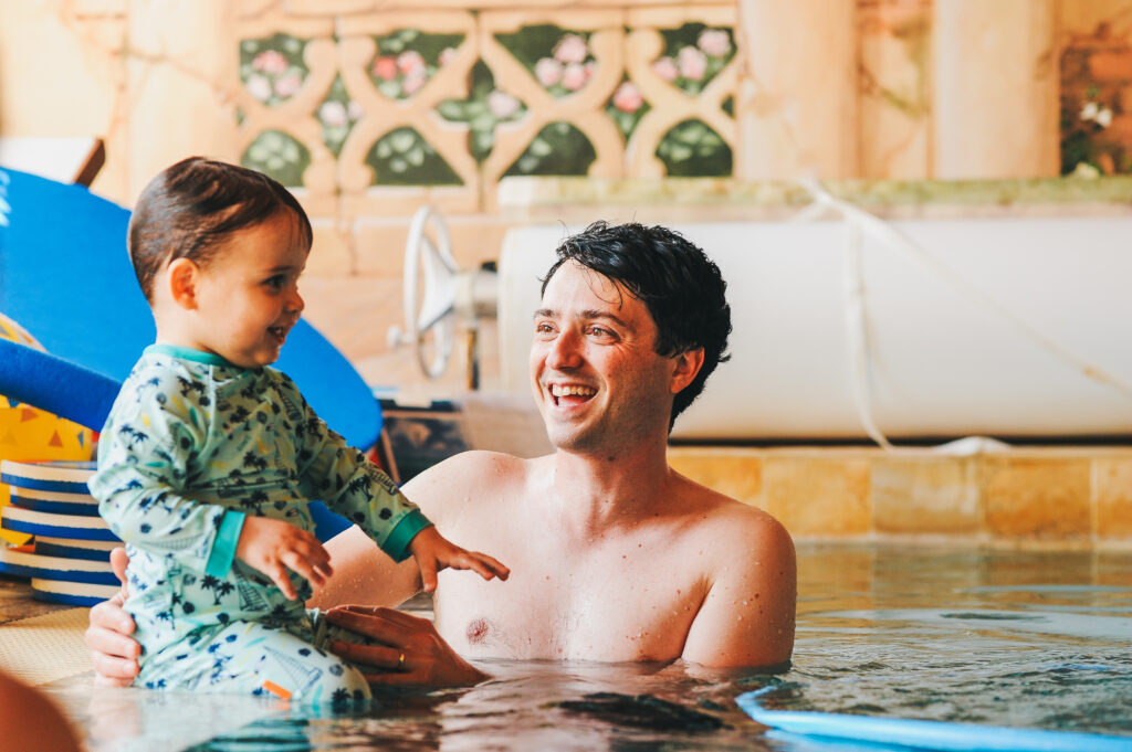 Bonding time with parents when learning to swim.